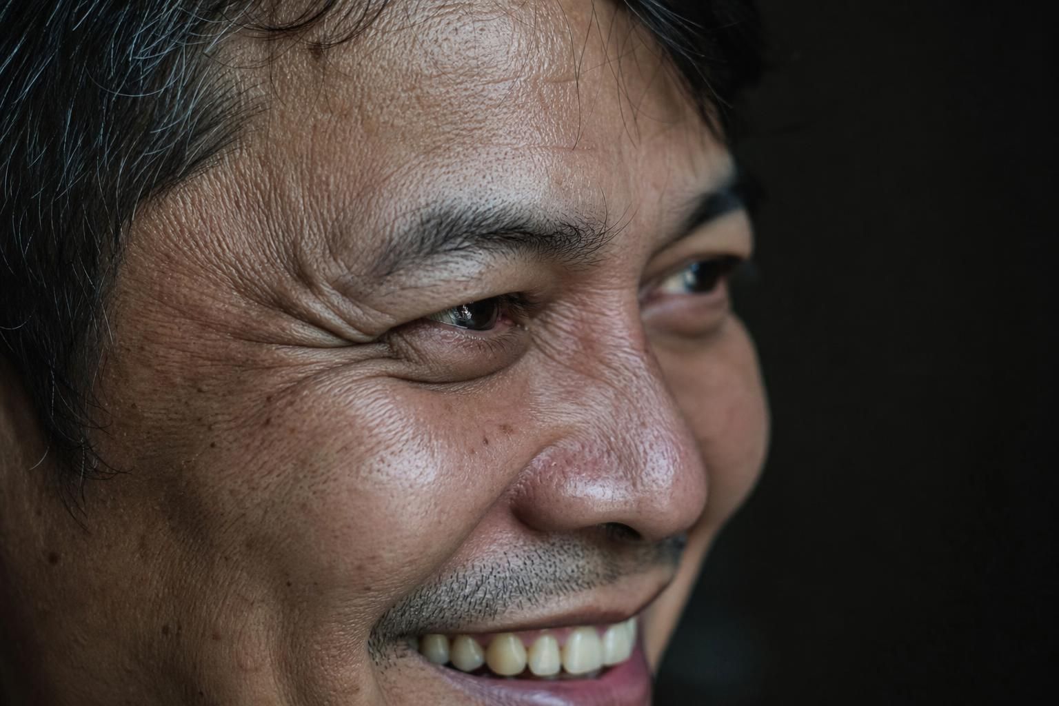 Illustrative example of Crow's feet on the male face